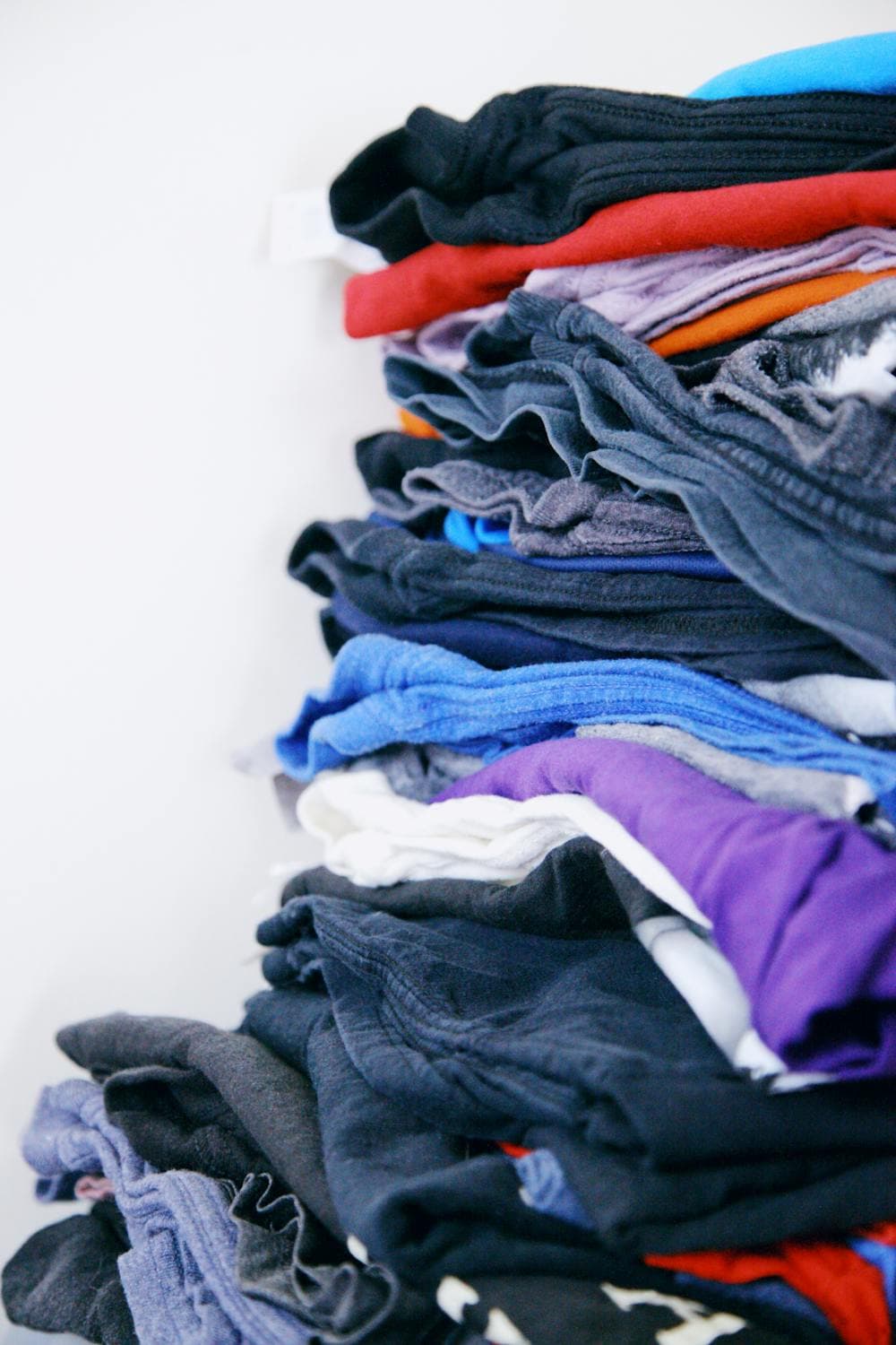 Wash and fold laundry service — clothes being neatly folded